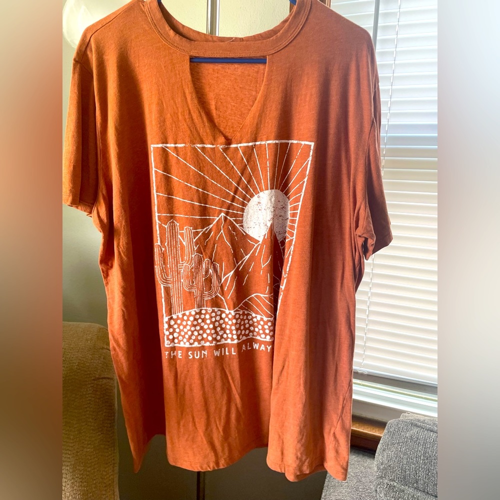 Orange Maurice’s shirt